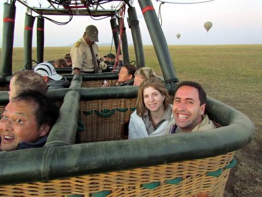 Scenic Hot Air Balloon Safari flying over Serengeti National Park savannah at sunrise