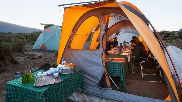 Budget group mountain camping setup on Mount Kilimanjaro
