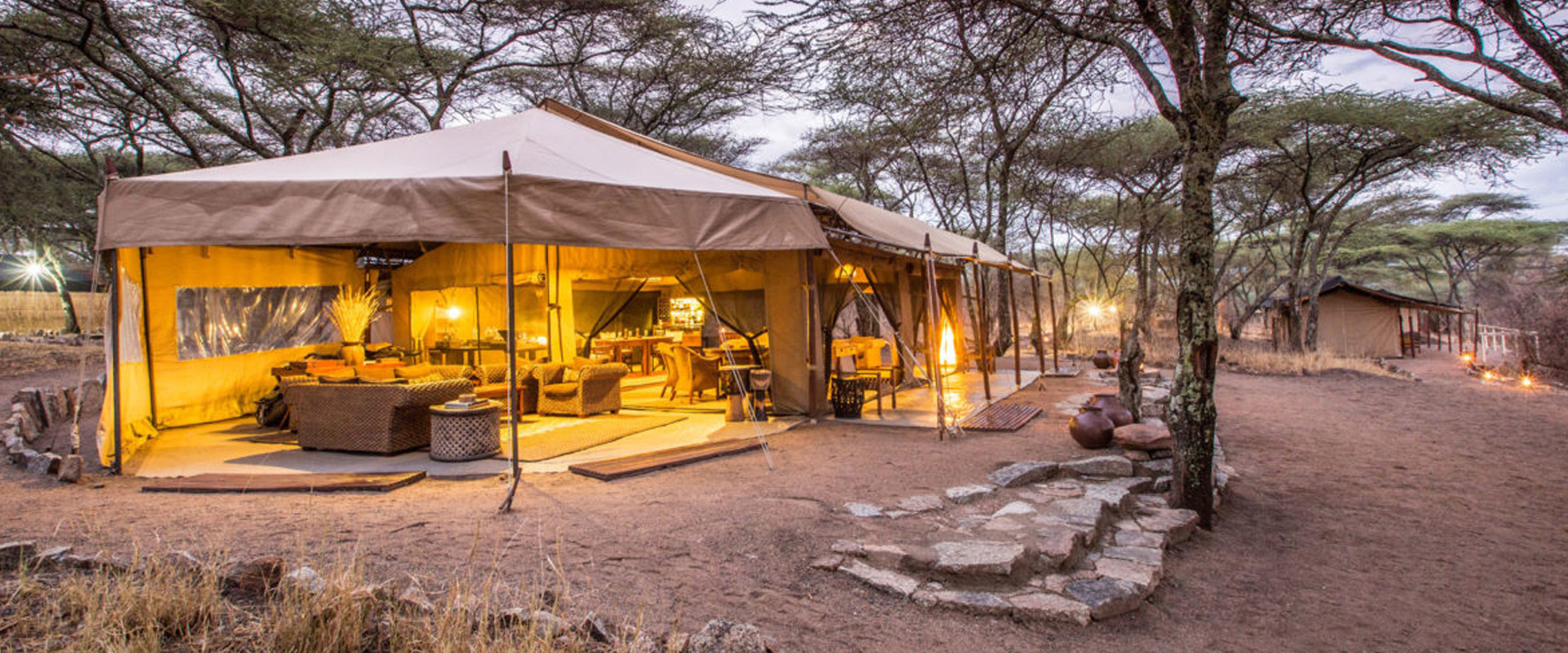 Ruaha mid-range safari lodge and vehicle